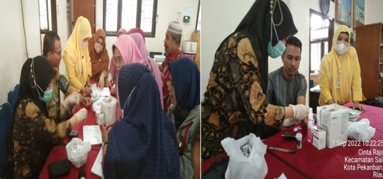 Warga SMKN 2 Pekanbaru Mengikuti Kegiatan Pemeriksaan Kesehatan dari Puskesmas Sail